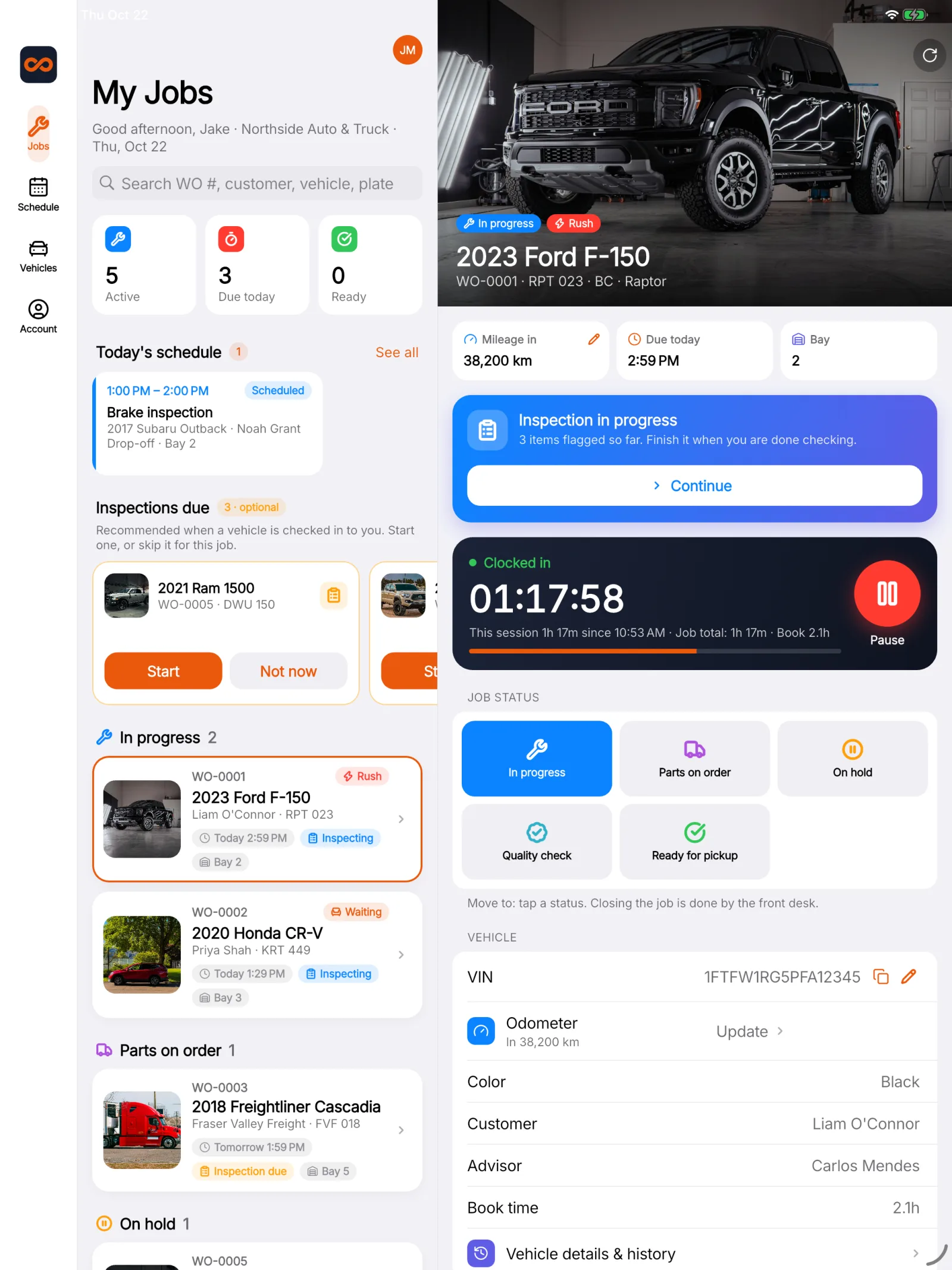 The technician app on an iPad: My Jobs with vehicle photos on the left, and the selected 2023 Ford F-150 job on the right with the running clock, status buttons and vehicle details